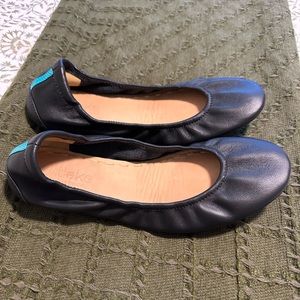 Tikes leather flats.